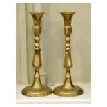 Pair of early 20th Century brass candlesticks, each with hexagonal decoration on domed bases