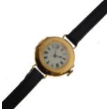 Early 20th Century lady's yellow metal wristwatch, white Roman dial with red numeral XII, case