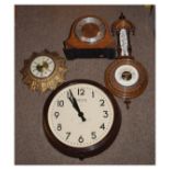 Brown Bakelite wall clock, Smiths gilt sunburst wall clock, oak mantel clock and an aneroid