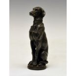 Base metal figure of a seated hound, possibly an accessory car mascot, 16cm high Condition: Some
