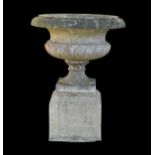 Antique marble urn of squat Campana type, 79cm diameter x 62cm high on an associated stone