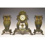 Art Nouveau bronzed spelter three piece clock garniture, the clock with cream Arabic dial, the two-