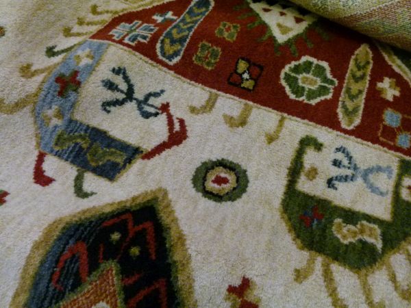 Modern Eastern style rug having geometric decoration on a mushroom ground within multiborders, 331cm - Image 3 of 4