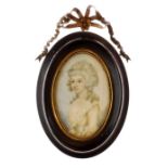 19th Century French School - Oval miniature - Portrait of a lady wearing a cream dress with a lace