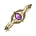 Edwardian amethyst and seed pearl brooch, unmarked, 4.4cm long, 4.6g gross Condition: The oval