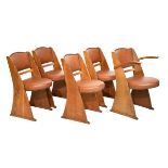 Ernest Gomme of High Wycombe - A set of five light oak 'Cromwell' chairs, comprising: four standards