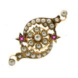 Edwardian seed pearl brooch, unmarked, the flowerhead centre with curled lines above and below