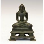 South East Asian green patinated bronze figure of a Buddha, probably 18th Century, seated in