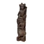 South East Asian carved hardwood atlante depicting two grappling demons, 80cm high Condition: