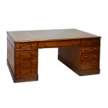 Late Victorian/Edwardian partners mahogany twin pedestal desk, the moulded rectangular top with