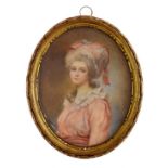 19th Century French School - Oval miniature - Portrait of a lady wearing a pink dress and bonnet,