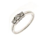 Three stone diamond platinum ring, the graduated brilliant cuts totalling approximately 0.5