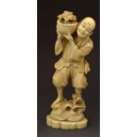 Japanese carved ivory okimono depicting a standing man, a basket of flowers on his shoulder, Meiji