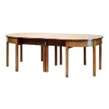 George III mahogany 'D' end dining table, comprising a pair of demi-lune end sections and two