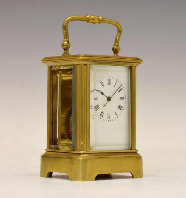 Early 20th Century brass cased 'mignonette' carriage timepiece, having a white Roman dial and single