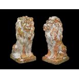 Garden Statuary - Large pair of terracotta gate finials modelled as seated lions on integral