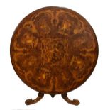 Figured walnut and marquetry centre table, the quartered circular top inlaid with a central panel of