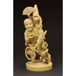 Japanese carved ivory okimono depicting a monkey trainer, Meiji period, 18.25cm high Condition: No