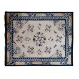 Modern Chinese carpet having traditional blue, pink and two-tone brown stylised decoration on a