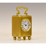 Late 19th/early 20th Century brass cased miniature carriage timepiece, having a 2cm diameter white