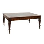 Late 19th/early 20th Century mahogany library table, the moulded rectangular top with gilt-tooled