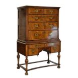 18th Century and later walnut-veneered chest on stand, the upper stage with cavetto-moulded