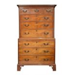 19th Century mahogany chest-on-chest or tallboy in the George III taste, the upper stage of canted