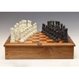 Wedgwood Prestige black and white jasper chess set, after the design by Arnold Machin of 1938,