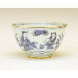 Small Chinese bowl having blue and white painted decoration depicting figures in a garden, the