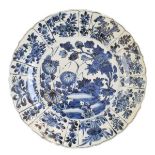 Chinese porcelain plate having allover blue and white painted decoration, the underside marked