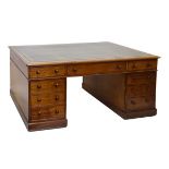 Late Victorian/Edwardian partners mahogany twin pedestal desk, the moulded rectangular top with