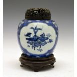 Chinese ovoid jar having blue and white painted decoration with two reserves showing antiques and