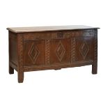 Late 17th Century oak coffer or bedding chest, the moulded rectangular top over lunette-carved