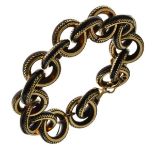 Tortoiseshell pique work bracelet, of circular links, to a bolt ring clasp, 20cm long Condition: One