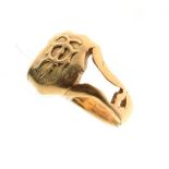 Gold coloured metal fraternity type ring having pierced shoulders and relief symbol, size S, 12.6g