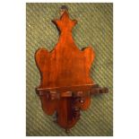 Late 19th/early 20th Century mahogany wall bracket of shaped design, possibly for a clock, 49cm high