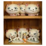 Assorted ceramics to include; group of seventeen wall pockets modelled as the heads of cats, etc