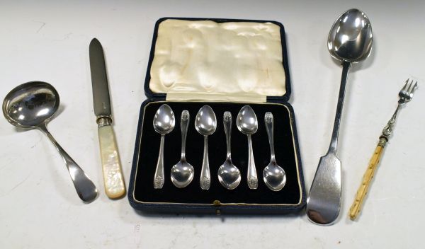 Set of six George V silver coffee spoons, Sheffield 1934, cased, together with four silver plated