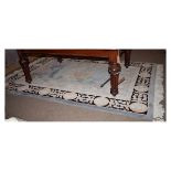 Modern Chinese rug having typical embossed decoration on a pale blue ground within multi borders,