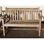 Slatted hardwood garden bench of plain design Condition: