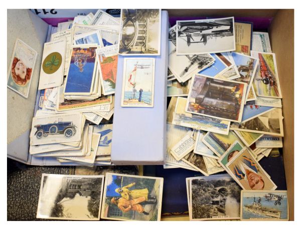 Box containing a large selection of assorted cigarette cards to include; an album of sets