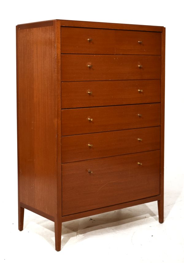 Mid 20th Century mahogany chest of two short over four long drawers on tapered supports, label of