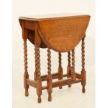 Small early 20th Century oak gateleg table with moulded top on barley sugar twist supports
