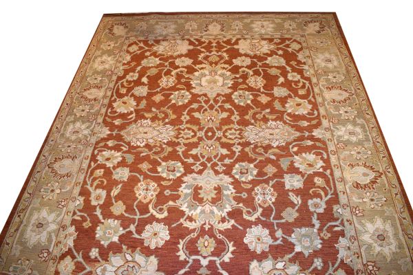 Good quality modern Zeigler rug having typical stylised foliate decoration on a brown ground