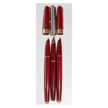 WITHDRAWN FROM SALE - Three Parker fountain pens, one with 14K gold nib, together with a red leather