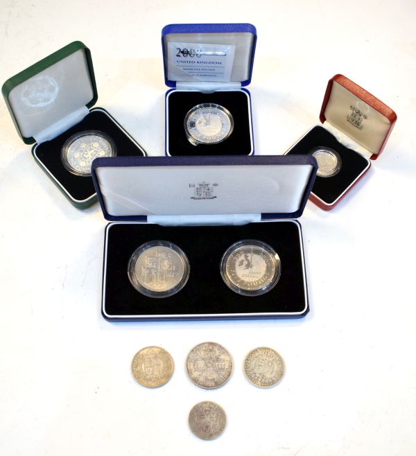 Coins - Various commemorative silver coinage in original cases of issue, together with a small