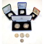 Coins - Various commemorative silver coinage in original cases of issue, together with a small