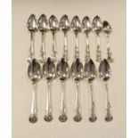 Matched set of fourteen Georgian silver Hour Glass pattern dessert spoons, 6 x London 1809, 6 x