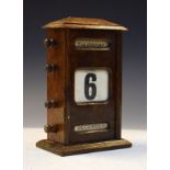 Early 20th Century oak desk calendar with adjustments for day, date and month Condition:
