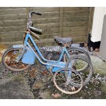 Child's vintage blue painted metal tricycle Condition:
